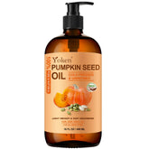 Yoken pumpkin seed oil bottle with pump for easy daily hair and skin care.