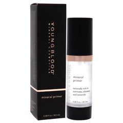 Youngblood Mineral Primer on hand demonstrates light, even application.