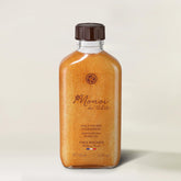 Yves Rocher Monoï Tahiti oil bottle with pearly glow for hydrated skin.