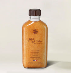 Yves Rocher Monoï Tahiti oil droplets illustrating quick absorption on skin.