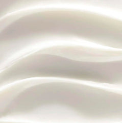 Rich texture swirl of Yves Rocher Riche Creme highlighting nourishing, smoothing cream.