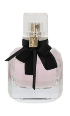 Mon Paris spray bottle shown for quick, stylish fragrance touchups.