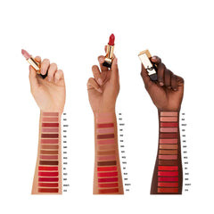 Yves Saint Laurent Brun Caftan shade in sleek gold tube on vanity highlights luxury and lip color.