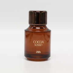 Zara Cocoa Sunset bottle closeup highlights creamy chocolate notes.