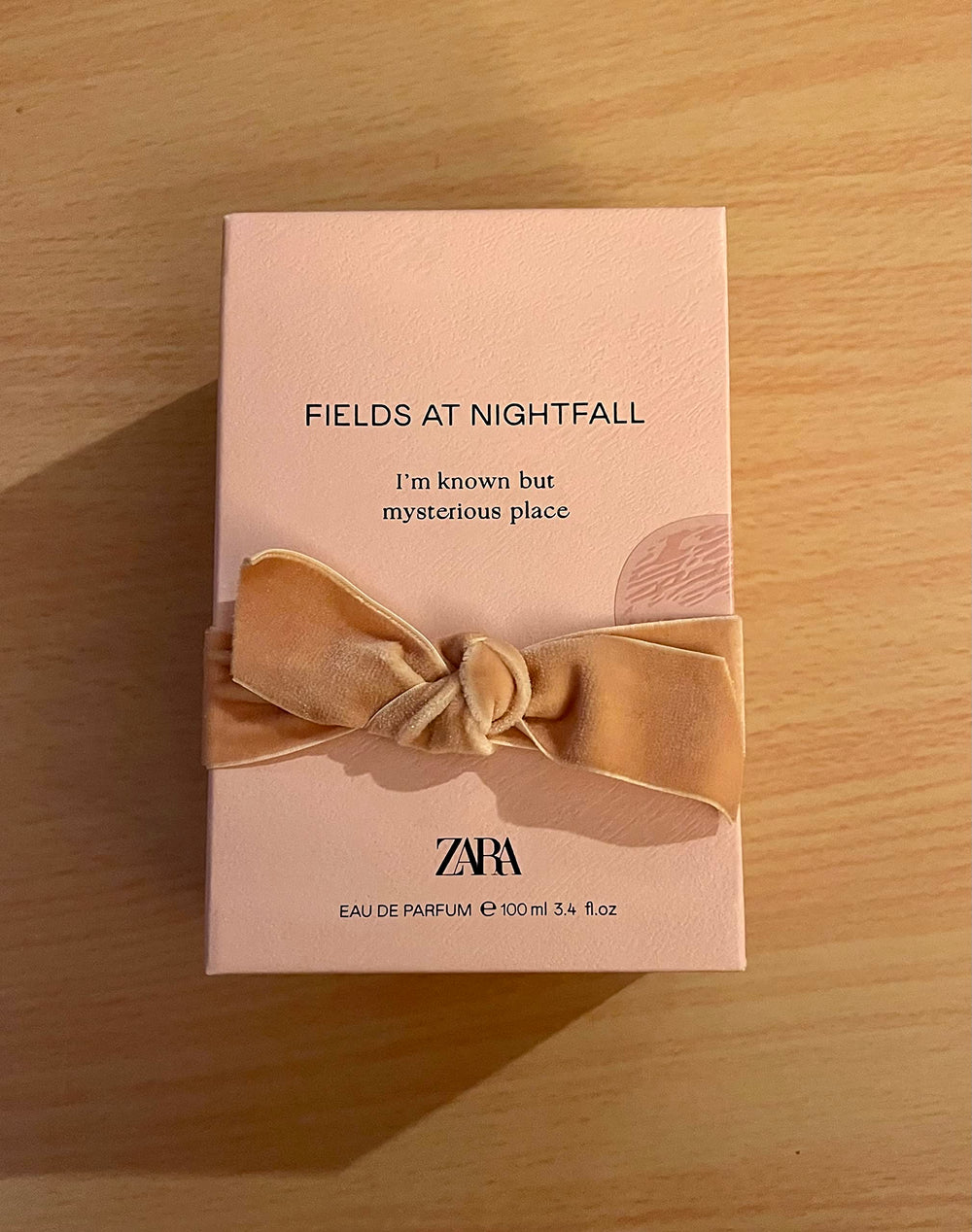ZARA Fields at Nightfall bottle front view, inviting warm woody-floral aroma ideal for evening wear.