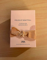 ZARA Fields at Nightfall bottle front view, inviting warm woody-floral aroma ideal for evening wear.