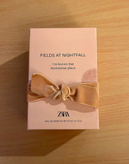 ZARA Fields at Nightfall bottle front view, inviting warm woody-floral aroma ideal for evening wear.