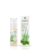 Zatik Gratitude Serum bottle close-up for radiant, hydrated skin.