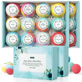 ZenBombs rose bath bomb with calming aroma for a relaxing soak.