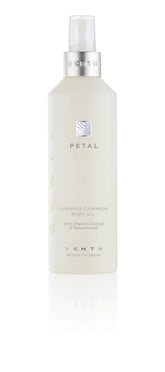 Zents Luminous Cashmere Body Oil bottle with Petal fragrance for a radiant glow.
