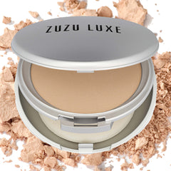 Zuzu Luxe Dual Powder Foundation D-7 swatch on skin showing natural finish.