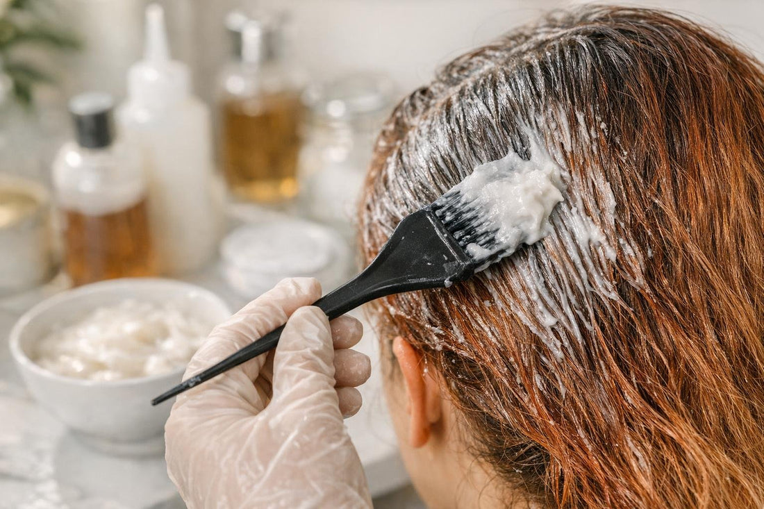 Close-up of hair care remover application on coloured hair
