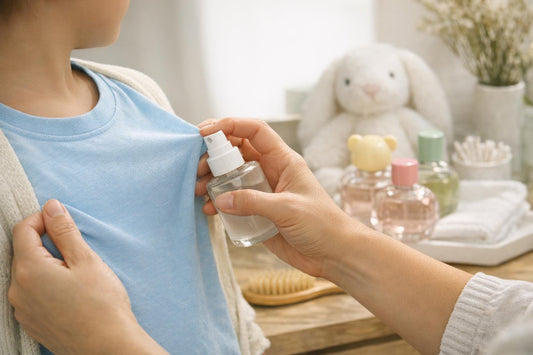 Parent applying a light kids fragrance on clothing