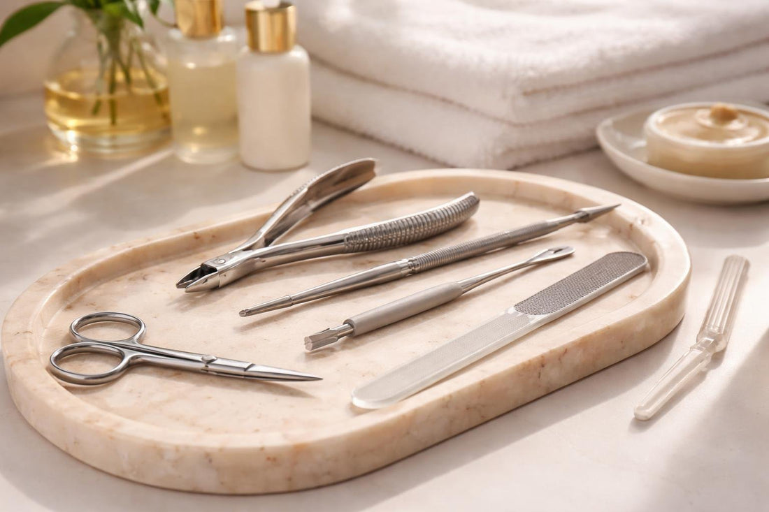 Assorted professional cuticle tools on tray for manicure