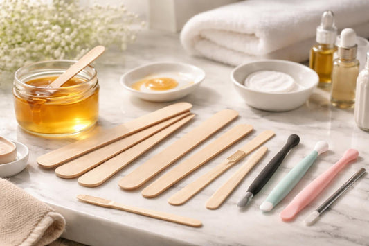 Variety of waxing spatulas and applicators laid out