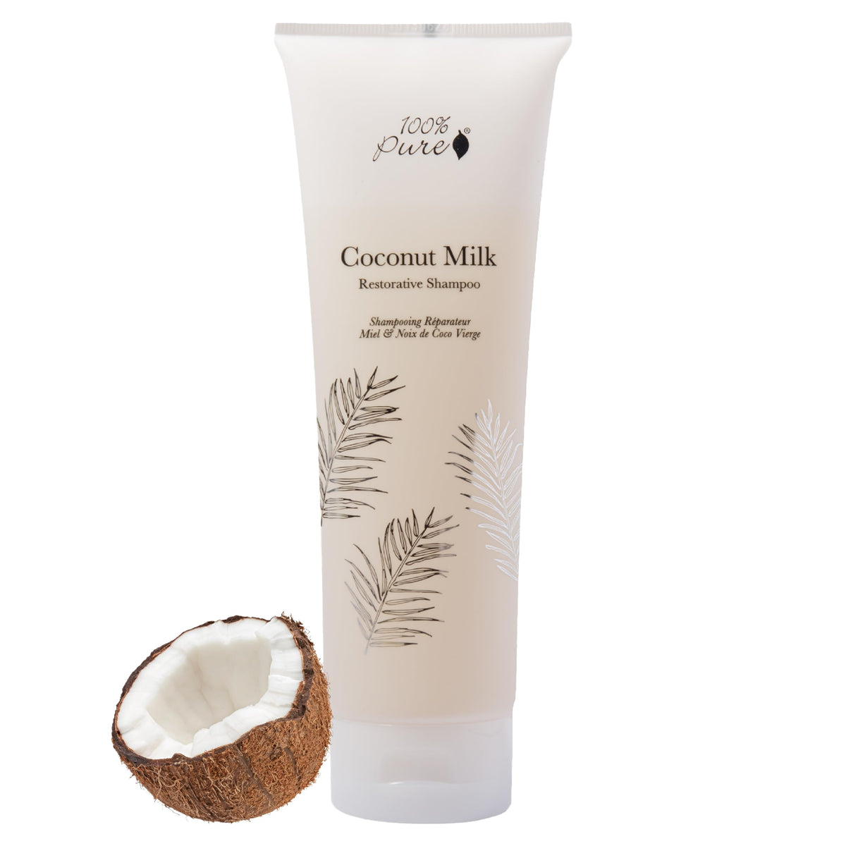 100% PURE Honey & Coconut Restorative Shampoo bottle pour for gentle cleansing and moisture boost
