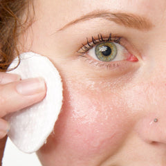 100% PURE Restorative Sea Essence Toner texture with hyaluronic acid for moisture.