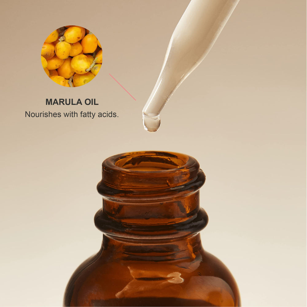 Hair application scene with 100% PURE Marula Oil demonstrating soft, lustrous texture