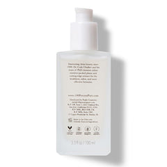 Closeup of 100% PURE Restorative Sea Essence Toner label highlighting organic witch hazel.