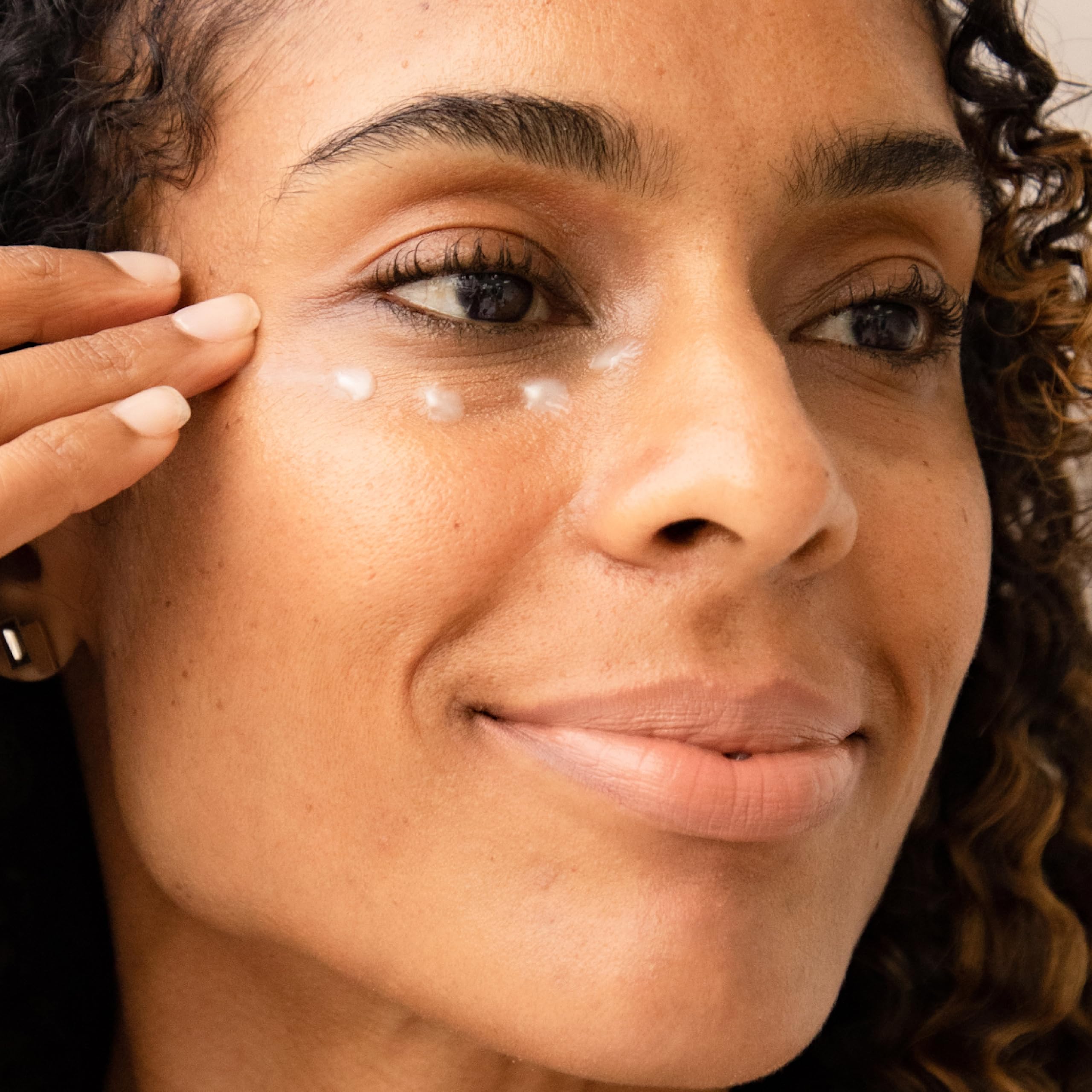 100% PURE eye cream box and jar highlighting organic ingredients