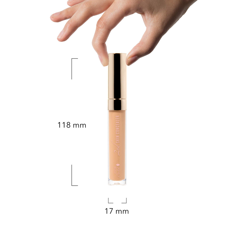 Vegan and cruelty-free symbol beside the concealer packaging