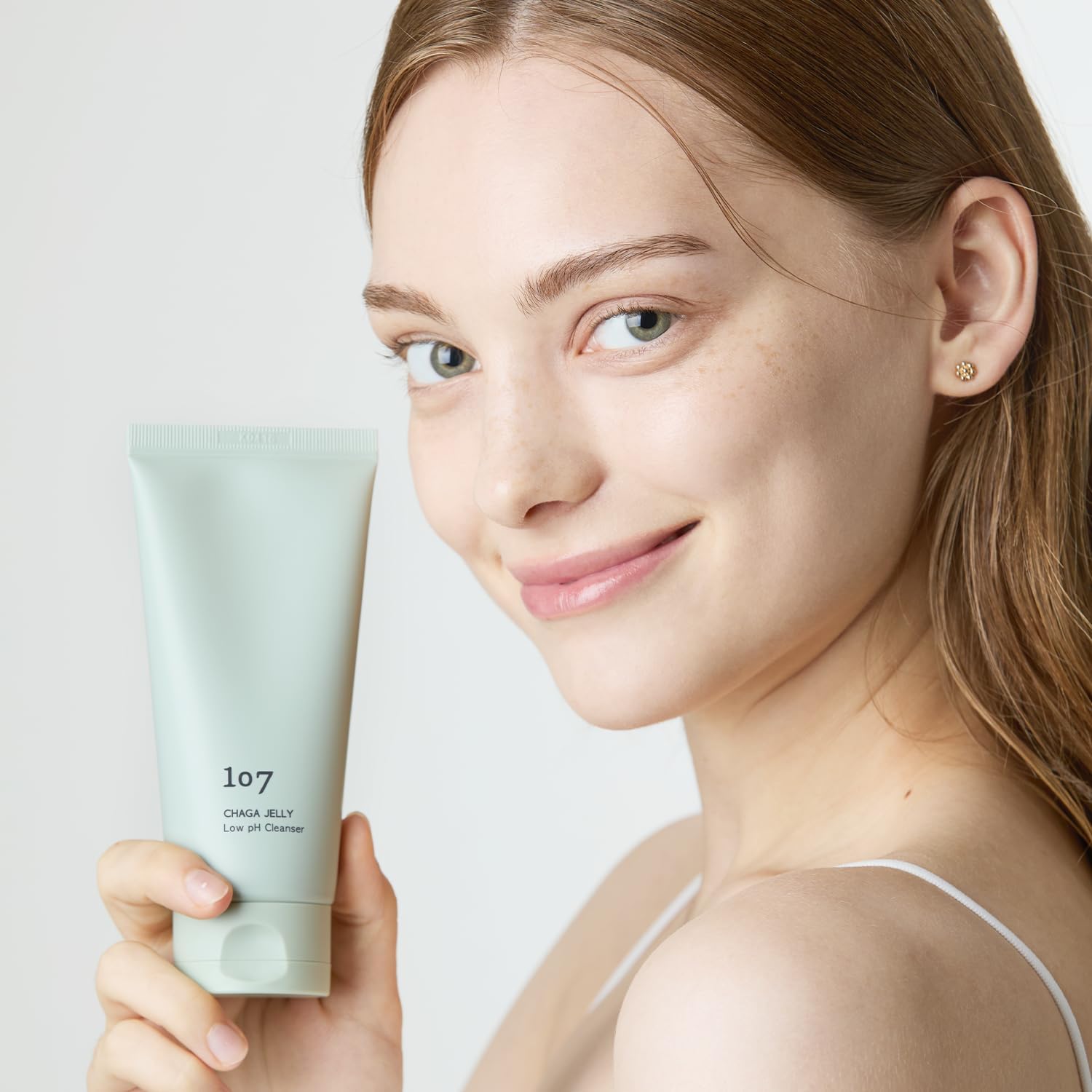 107 Gentle Gel Cleanser foam close-up shows rich, gentle lather for sensitive skin