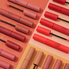 Product shot of 3CE Velvet Lip Tint New Nude highlighting the oil-packed formula.