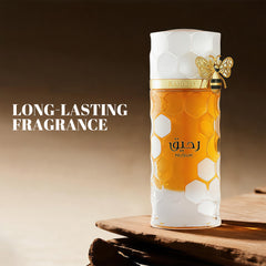 A CENTER Raheeq base notes deliver lasting vanilla musk and sandalwood warmth.