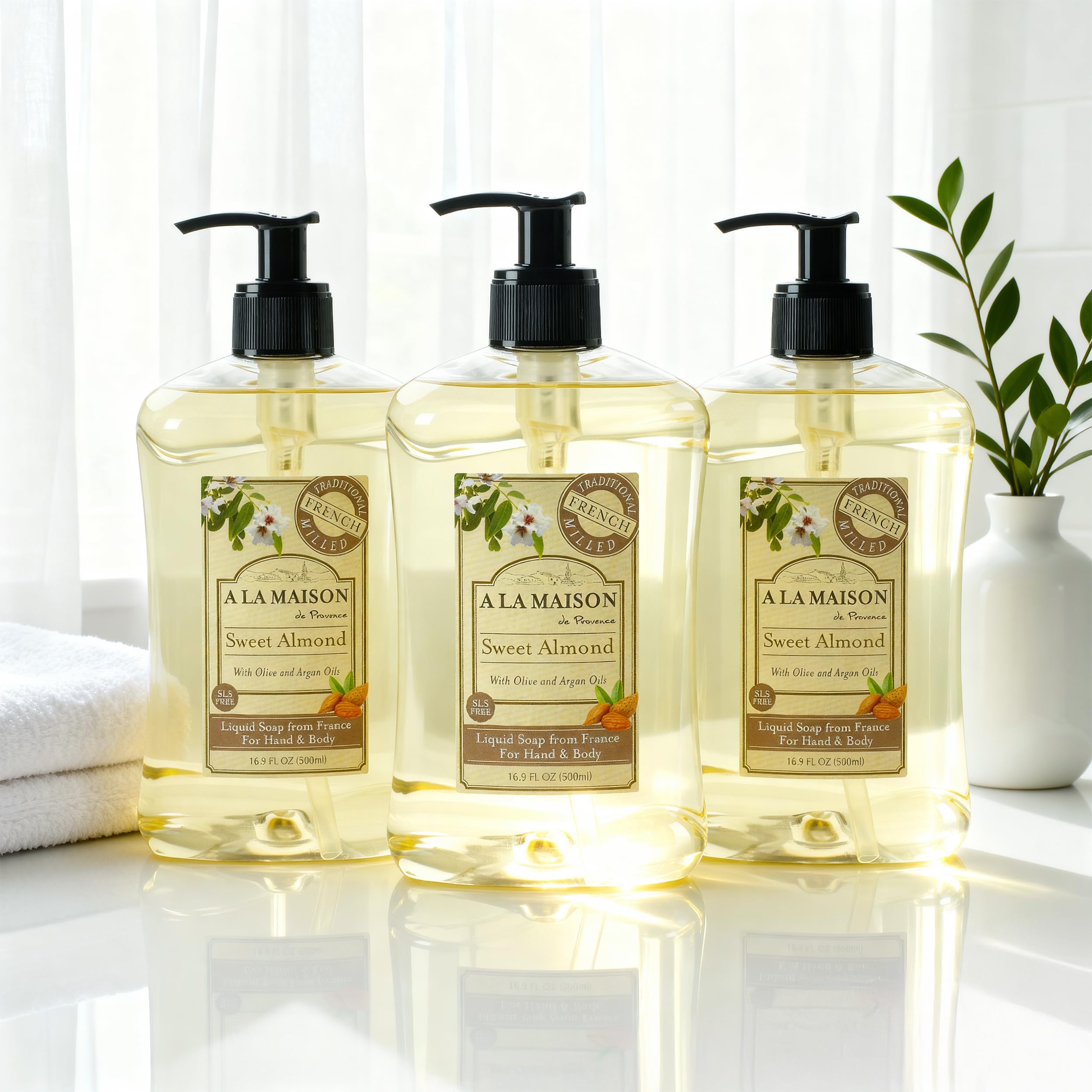 A LA MAISON Almond hand soap packaging showing eco-friendly, recyclable bottle.