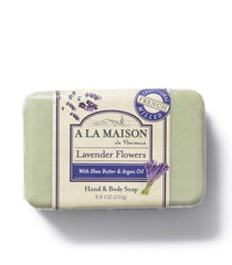 A LA MAISON Lavender Flower Bar Soap resting on a bathroom shelf with soothing aroma