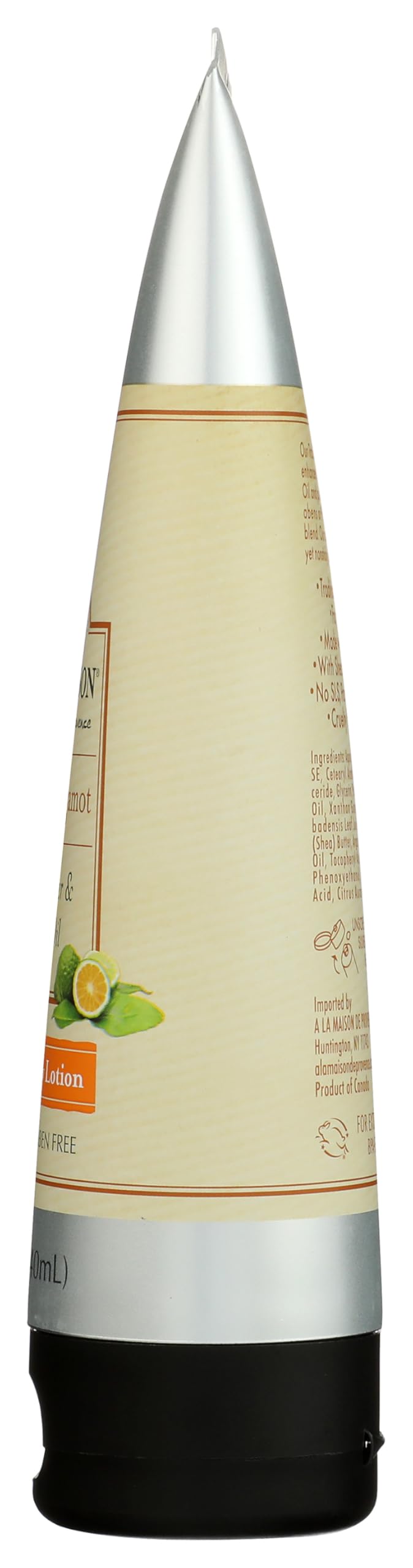 A LA MAISON Orange Bergamot Body Lotion texture close-up reveals smooth, light feel.