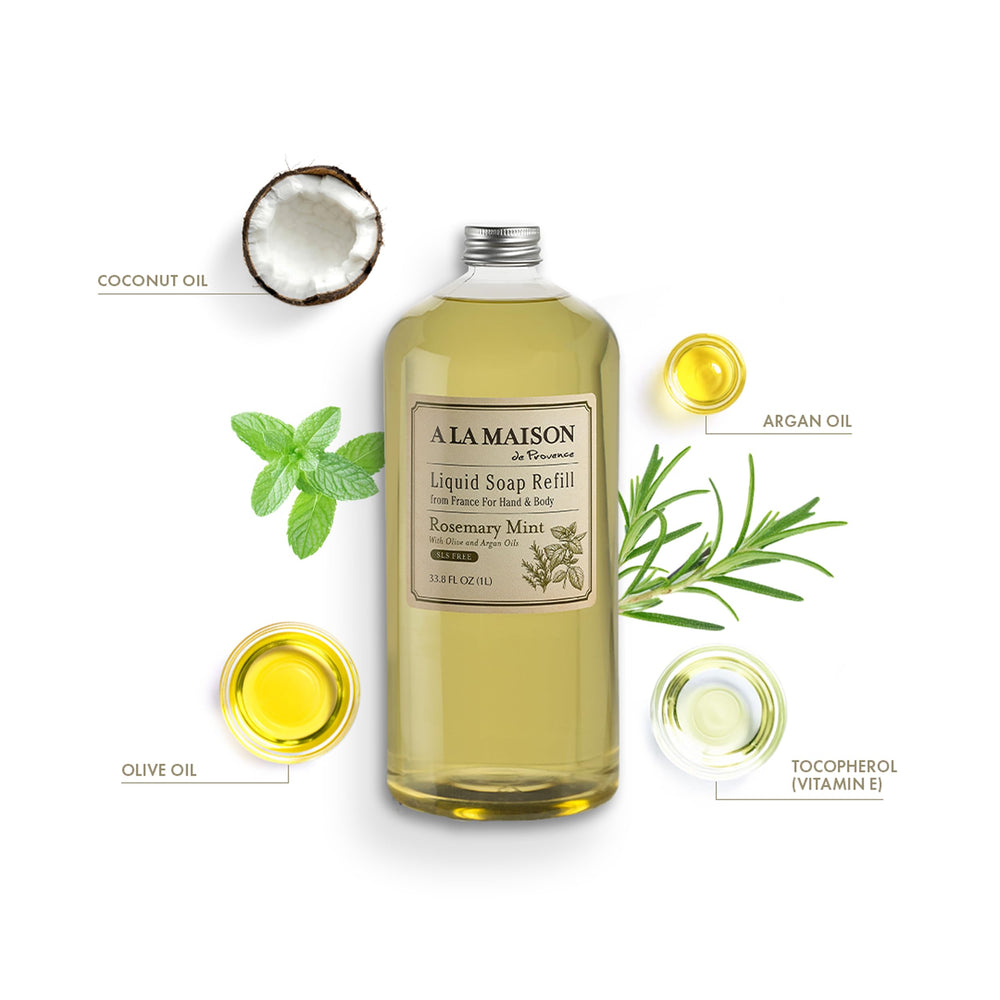 Close-up of A LA MAISON Rosemary Mint refill bottle close-up emphasizing skin-softening lather.