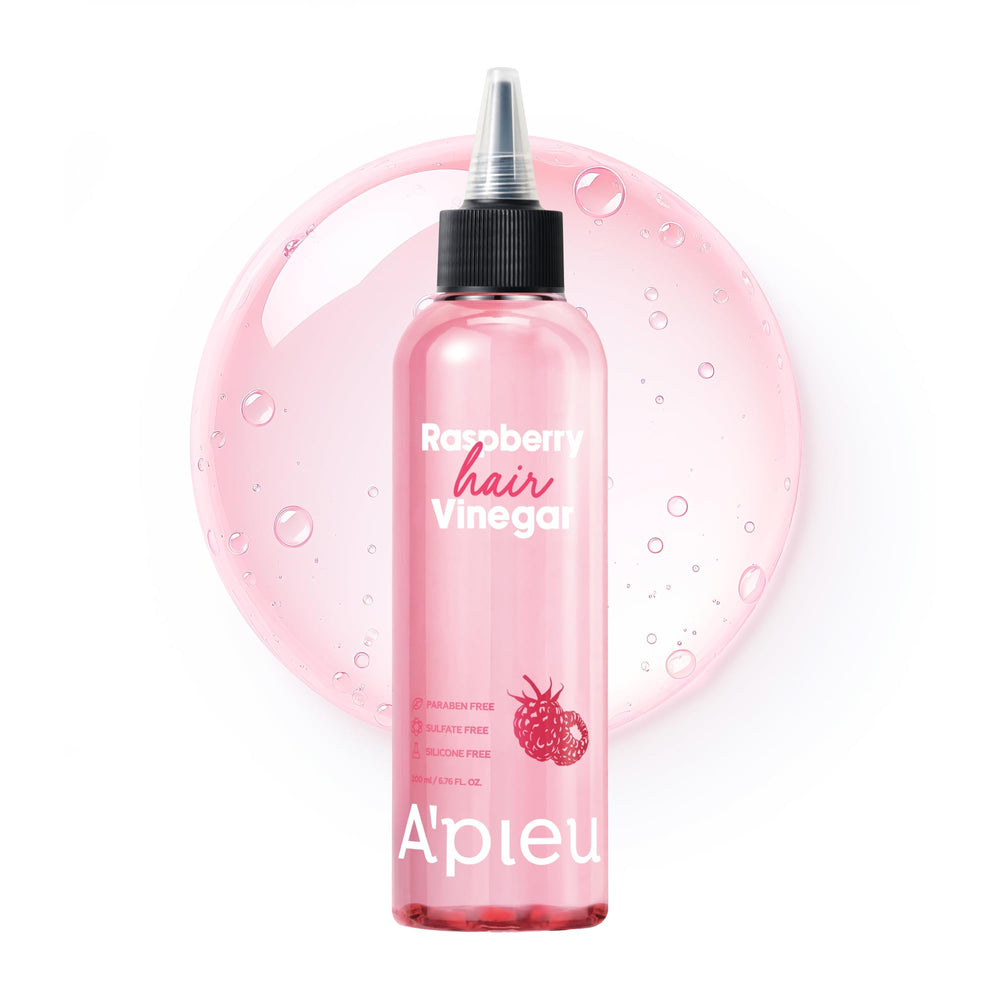 Packaging close-up of A'PIEU Raspberry Hair Vinegar rinse signaling Korean beauty craftsmanship