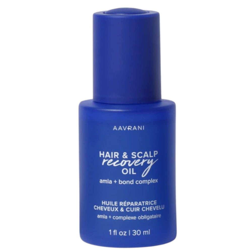AAVRANI Hair & Scalp Recovery Oil bottle pouring for scalp nourishment and frizz control
