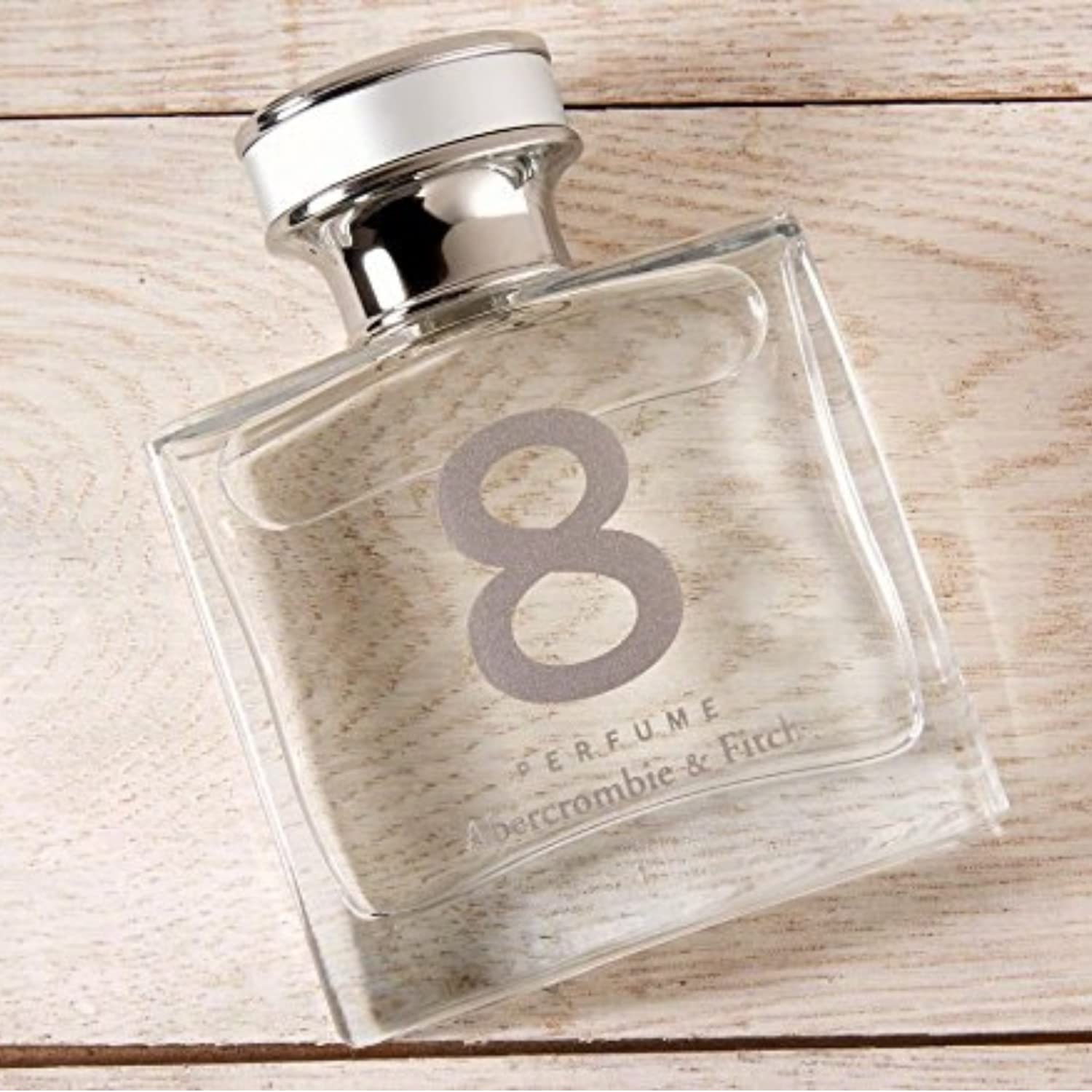 Abercrombie & Fitch Women Perfume cap close-up; secure closure for travel.