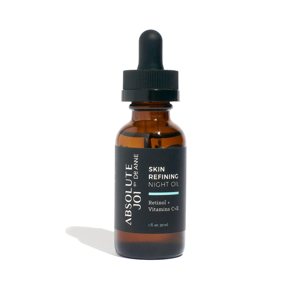 AbsoluteJOI retinol oil serum bottle closeup for a gentle, skin-refining night routine.