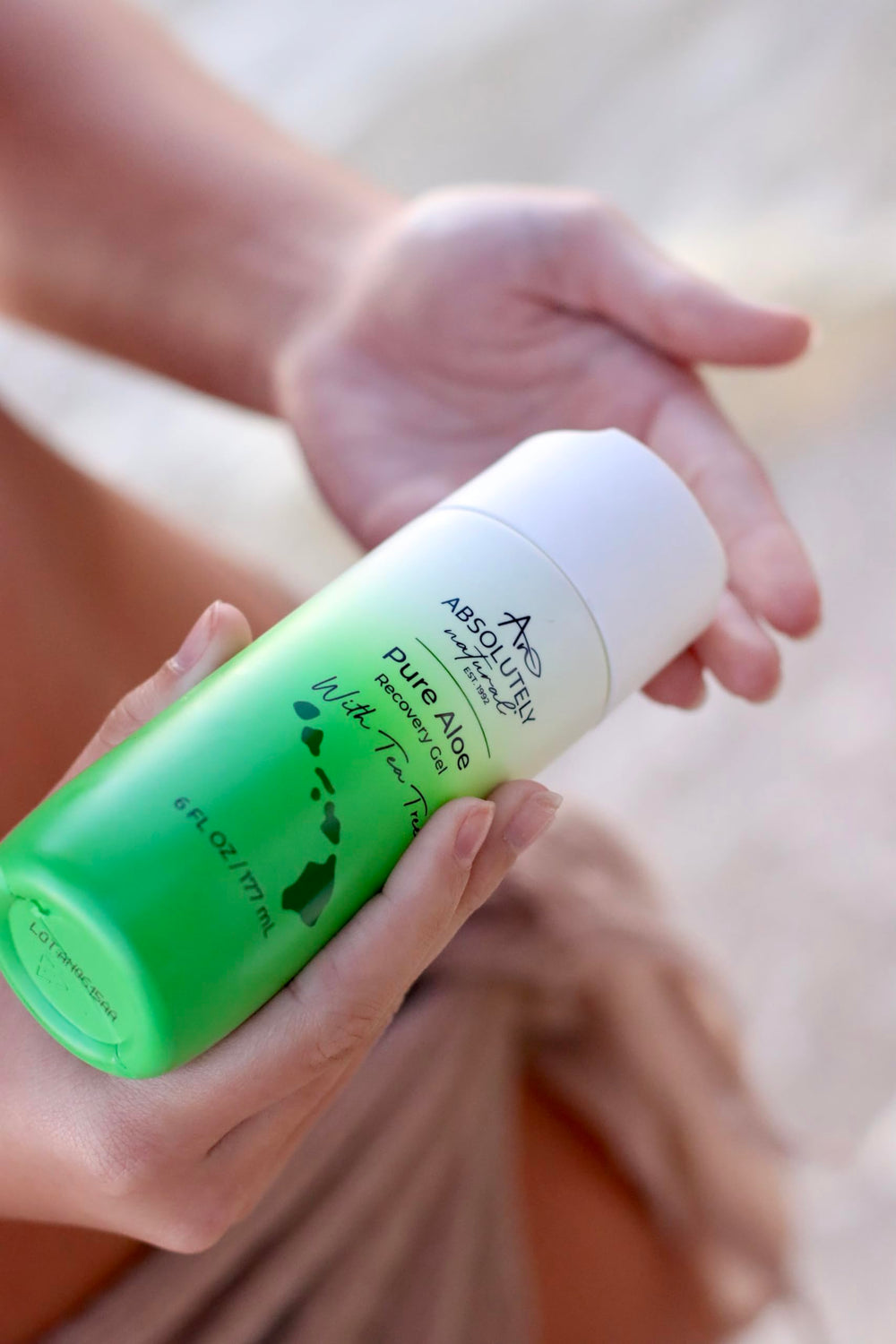 Absolutely Natural Aloe Vera Gel label closeup with vitamin E and eucalyptus.