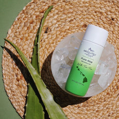 Absolutely Natural Aloe Vera Gel being applied to skin for gentle absorption.