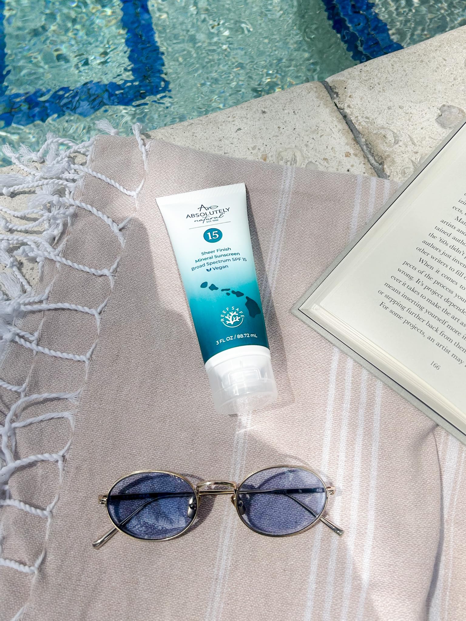 Absolutely Natural SPF 15 box and 3 oz bottle for travel.