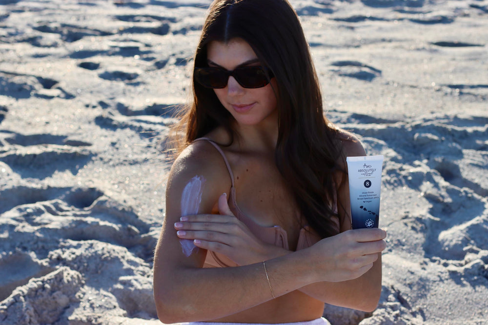 Absolutely Natural mineral sunscreen swatch on skin showing sheer protection.