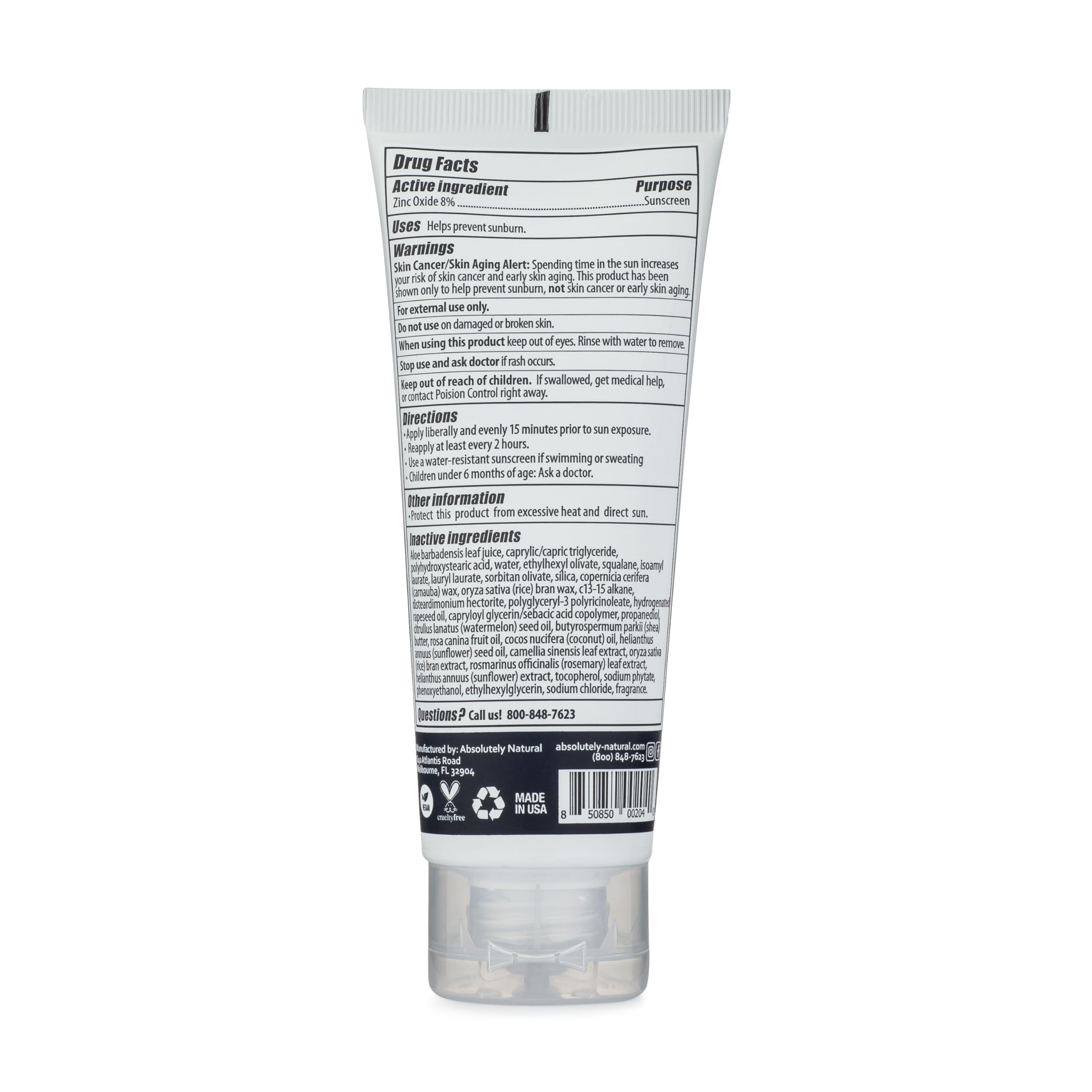 Absolutely Natural creamy sunscreen texture spread on skin.