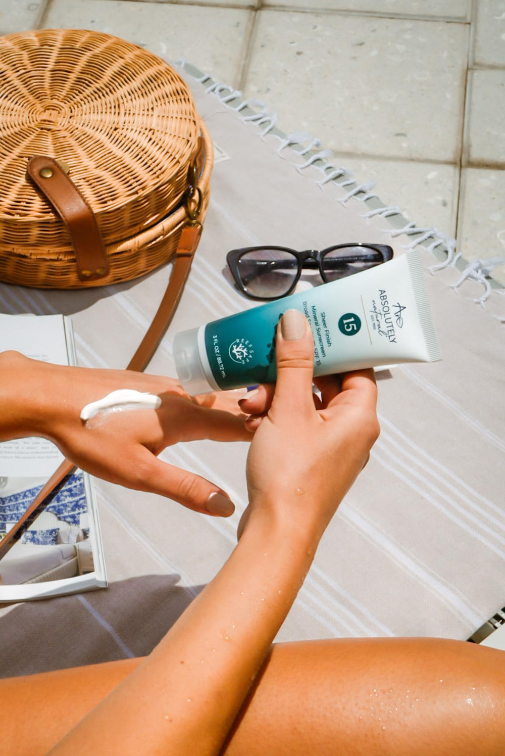 Absolutely Natural sunscreen label indicating water resistance during activity.