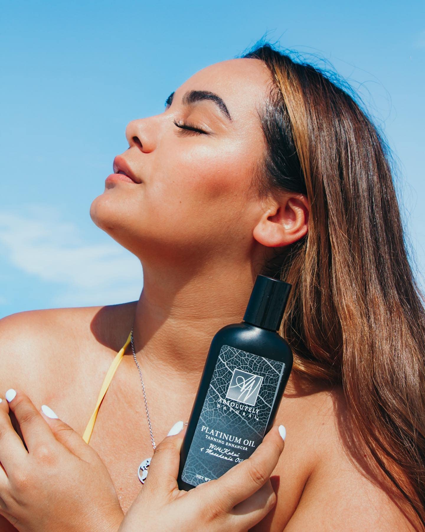 Absolutely Natural tanning oil reef safe formula protects oceans.