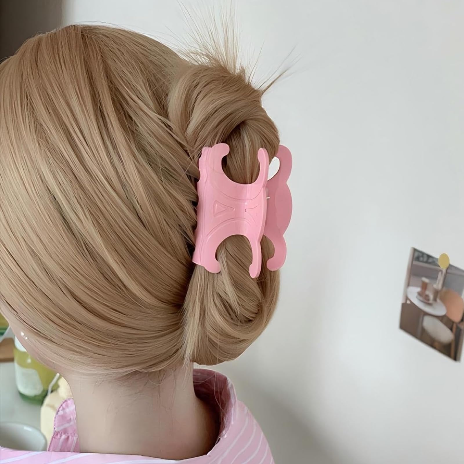 Close-up of acetate butterfly clip surface highlighting smooth teeth