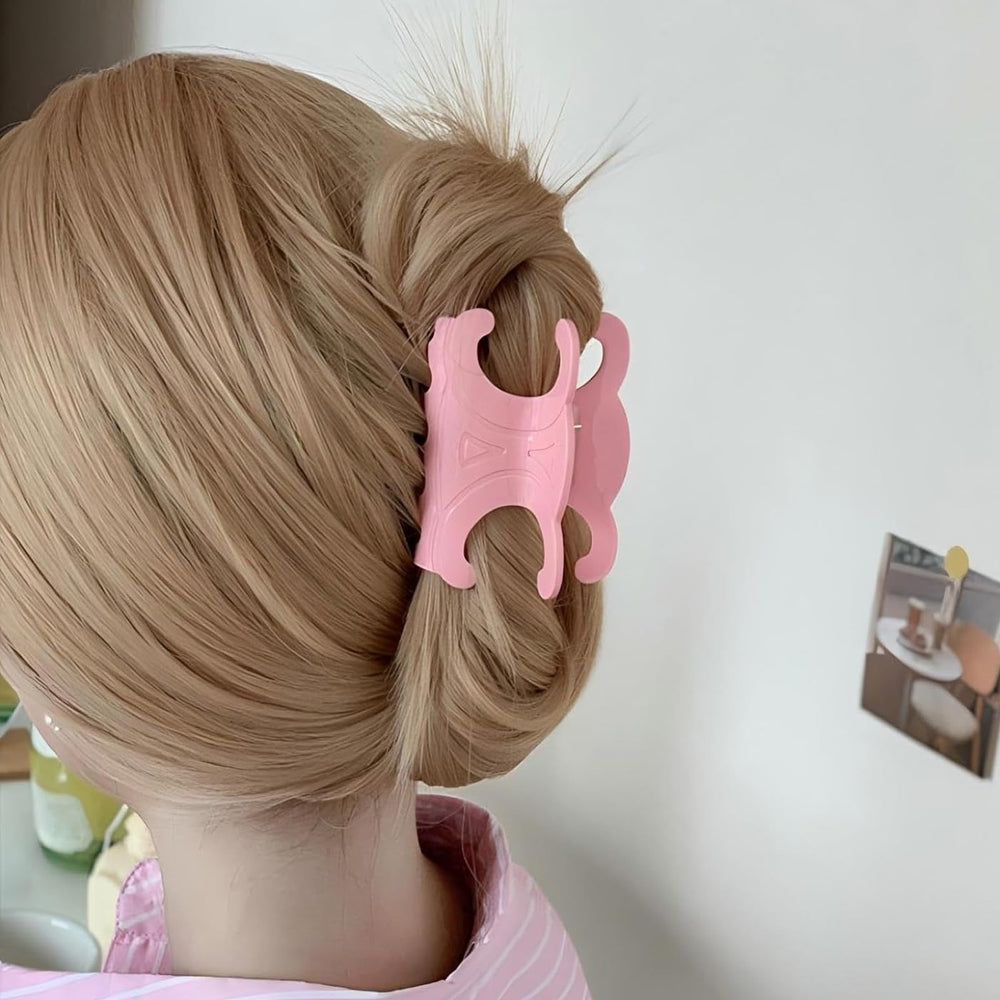 Close-up of acetate butterfly clip surface highlighting smooth teeth