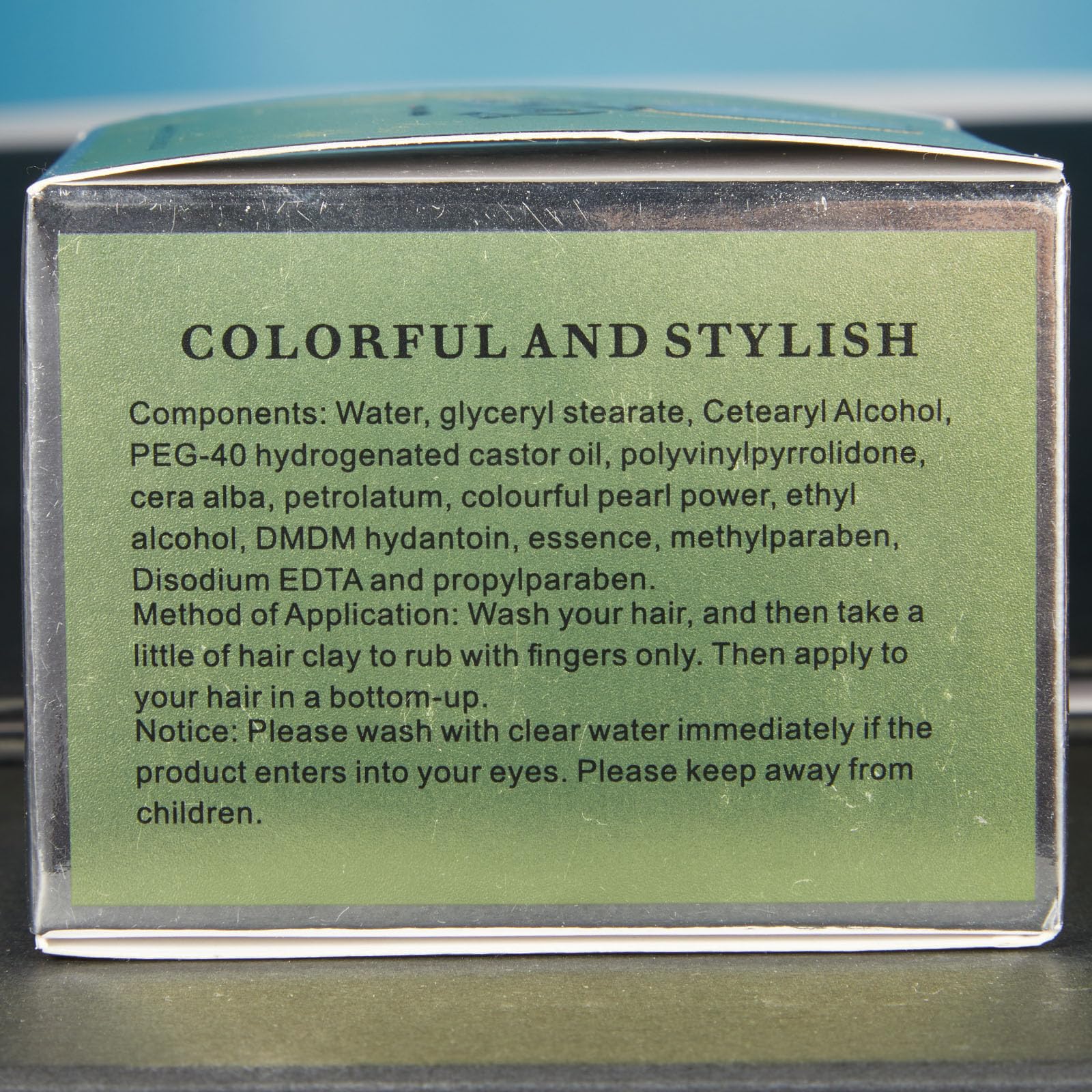 Acomler shade note indicating dark gray not pure black