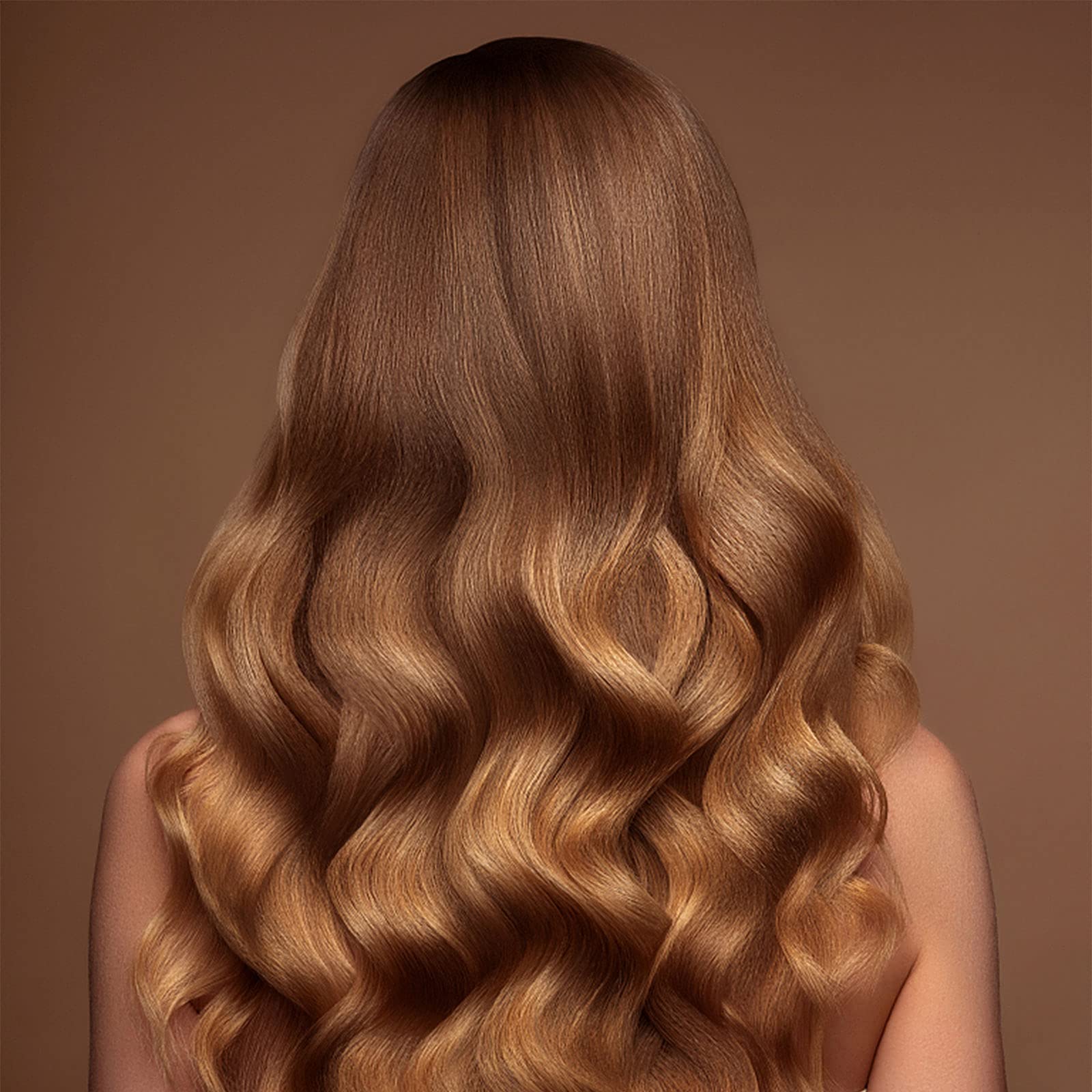 Acomler hair wax color streak appears on the strand.