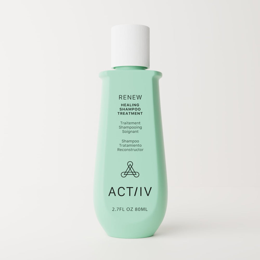 ACTIIV Renew shampoo label close-up, plant-based formula for damaged hair
