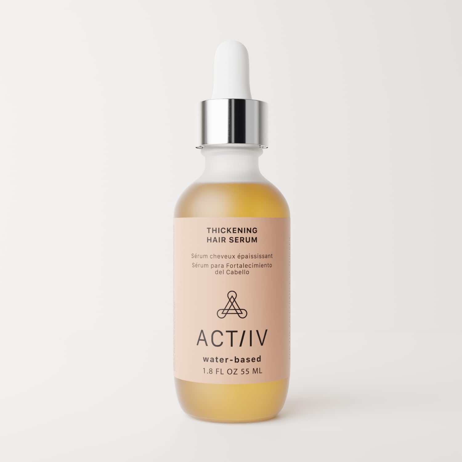ACTIIV Thickening Hair Serum pump demonstrates easy, precise dispensing.
