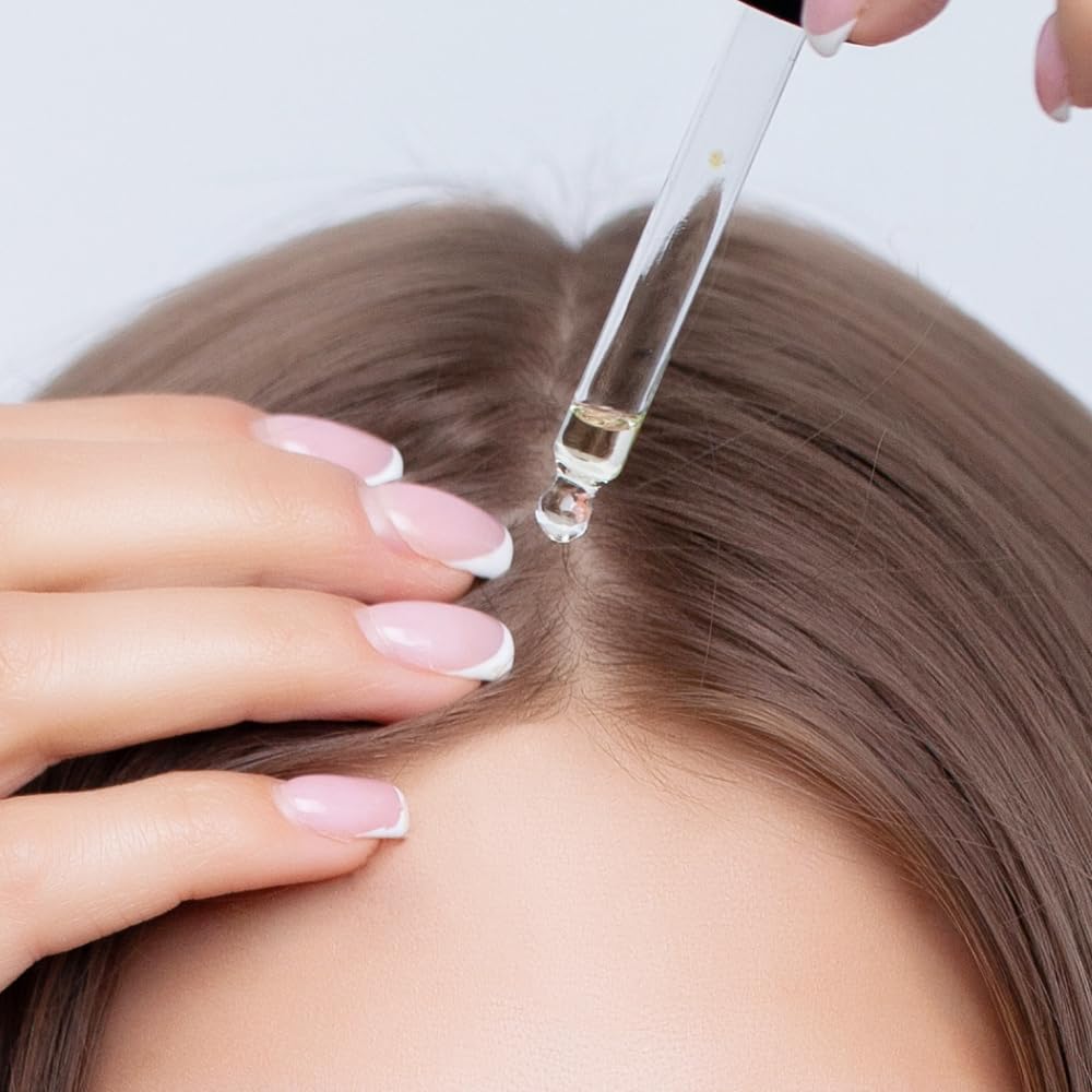 Actsyl-3 hair growth serum used at night on damp hair for convenience.